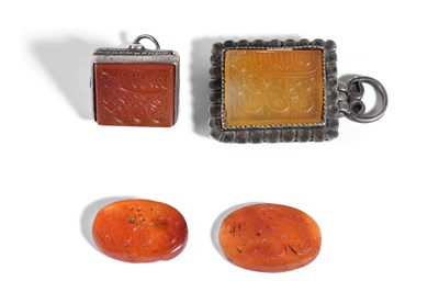 Lot 18 - FOUR QAJAR INTAGLIO SEALS WITH PRAYERS