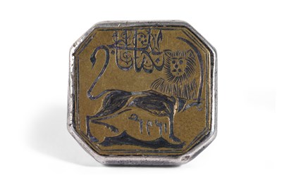 Lot 14 - A MOUNTED QAJAR BRASS SEAL WITH THE SHIR O SHAMSHIR (LION AND SWORD) SYMBOL