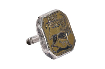 Lot 14 - A MOUNTED QAJAR BRASS SEAL WITH THE SHIR O SHAMSHIR (LION AND SWORD) SYMBOL