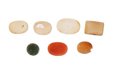 Lot 31 - SEVEN ENGRAVED HARDSTONE AMULETS WITH QURANIC SURAS AND PRAYERS