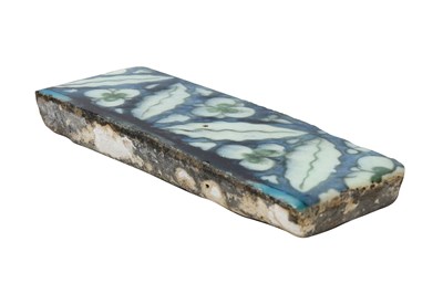 Lot 168 - AN OTTOMAN DAMASCUS ÇINTAMANI BORDER POTTERY TILE