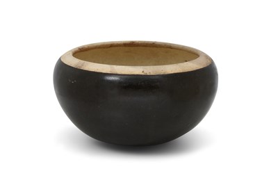 Lot 9 - A BROWN-GLAZED ALMS BOWL