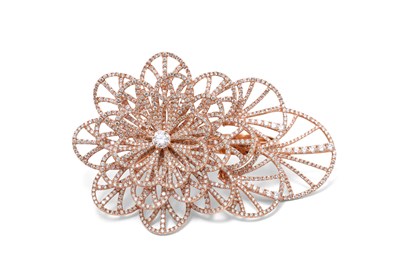 Lot 29 - A JACOB & CO. 18K ROSE GOLD PAVE DIAMOND TWO-FINGER FLOWER COCKTAIL RING