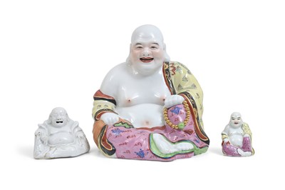 Lot 37 - A WHITE-GLAZED AND TWO FAMILLE ROSE FIGURES OF BUDAI HESHANG