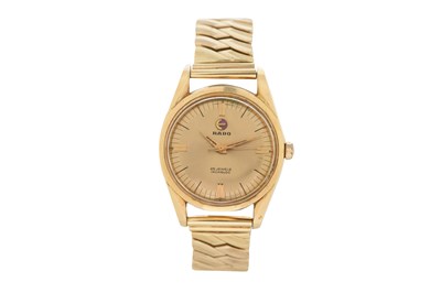 Lot 78 - A RARE MEN'S RADO 14K YELLOW GOLD AUTOMATIC BRACELET WATCH.