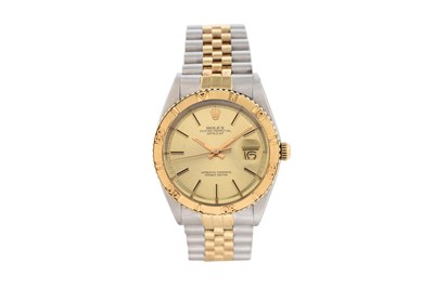 Lot 68 - A MEN'S ROLEX 18K YELLOW GOLD AND STAINLESS STEEL AUTOMATIC BRACELET WATCH.