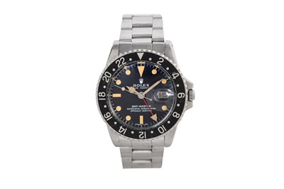 Lot 3 - A COLLECTABLE MEN'S ROLEX STAINLESS STEEL GMT AUTOMATIC BRACELET WATCH.