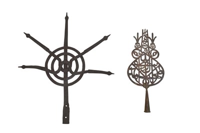 Lot 90 - A PIERCED COPPER SHI'A 'ALAM (STANDARD) AND A HINDU STEEL FINIAL WITH SPIKES