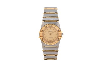 Lot 9 - A LADIES 18K YELLOW GOLD AND STAINLESS STEEL QUARTZ BRACELET WATCH.